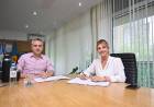 la intendenta Marisa Fassi y el ministro Andrés Larroque firmaron convenios sobre la niñez